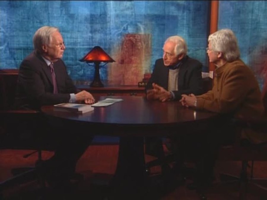 three men talking politics