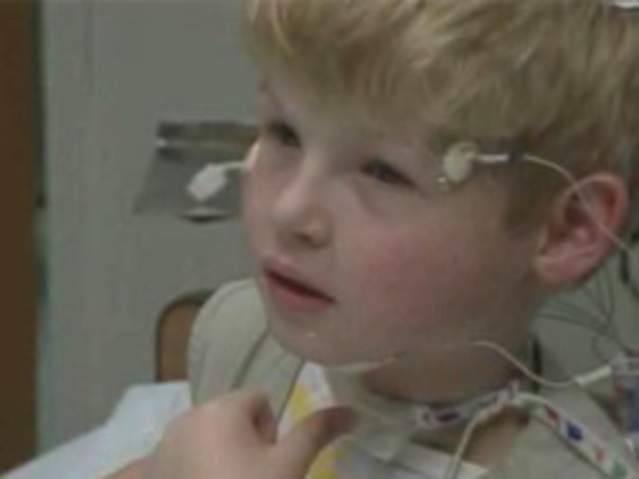 little boy being examined