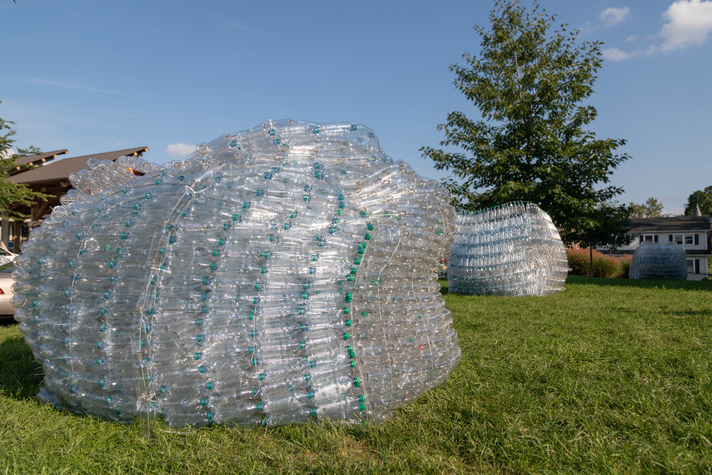 Artist-in-residence Willie Cole creates art using plastic bottles
