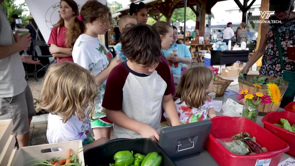 Public health graduate students lead camp to teach children about health, well-being