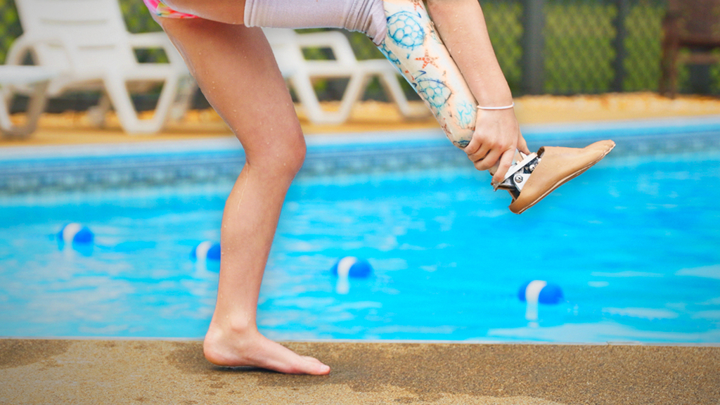 Students design prosthetic foot for young swimmer