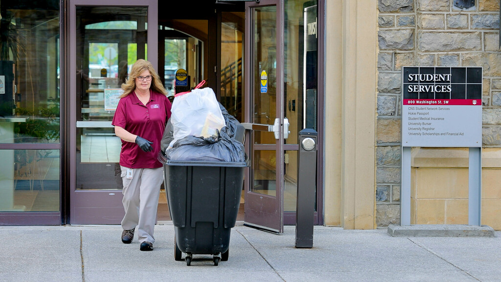 Facilities housekeeper  loves her "work family"