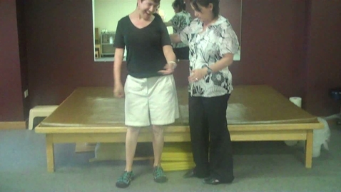 Thumbnail for Transition sitting to standing by an individual with a traum