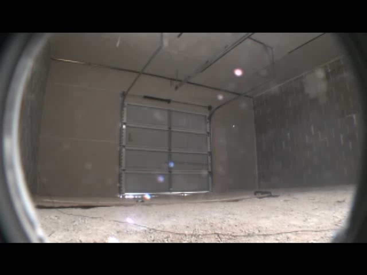 Test 3: Dispersion and Burning Behavior of Hydrogen Released in a Full-Scale Residential Garage in the Presence and Absence of Conventional Automobiles (View of garage interior from floor camera)