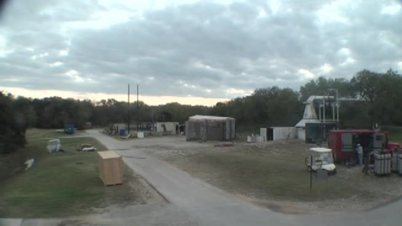 Test 8: Dispersion and Burning Behavior of Hydrogen Released in a Full-Scale Residential Garage in the Presence and Absence of Conventional Automobiles (View of garage exterior from HD camera view 2)