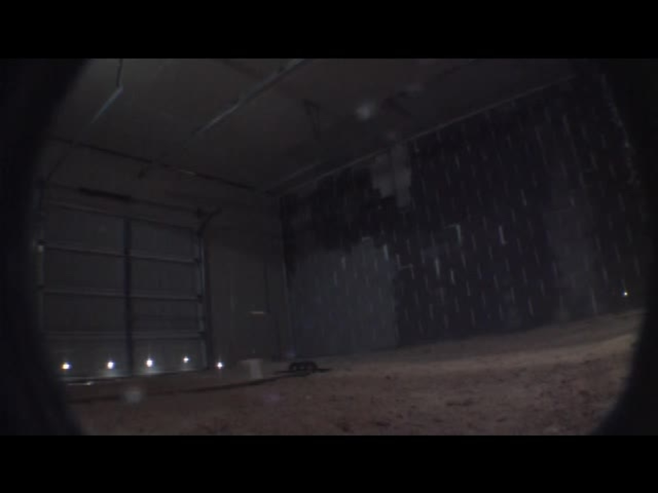 Test 2: Dispersion and Burning Behavior of Hydrogen Released in a Full-Scale Residential Garage in the Presence and Absence of Conventional Automobiles (View of garage interior from floor camera)