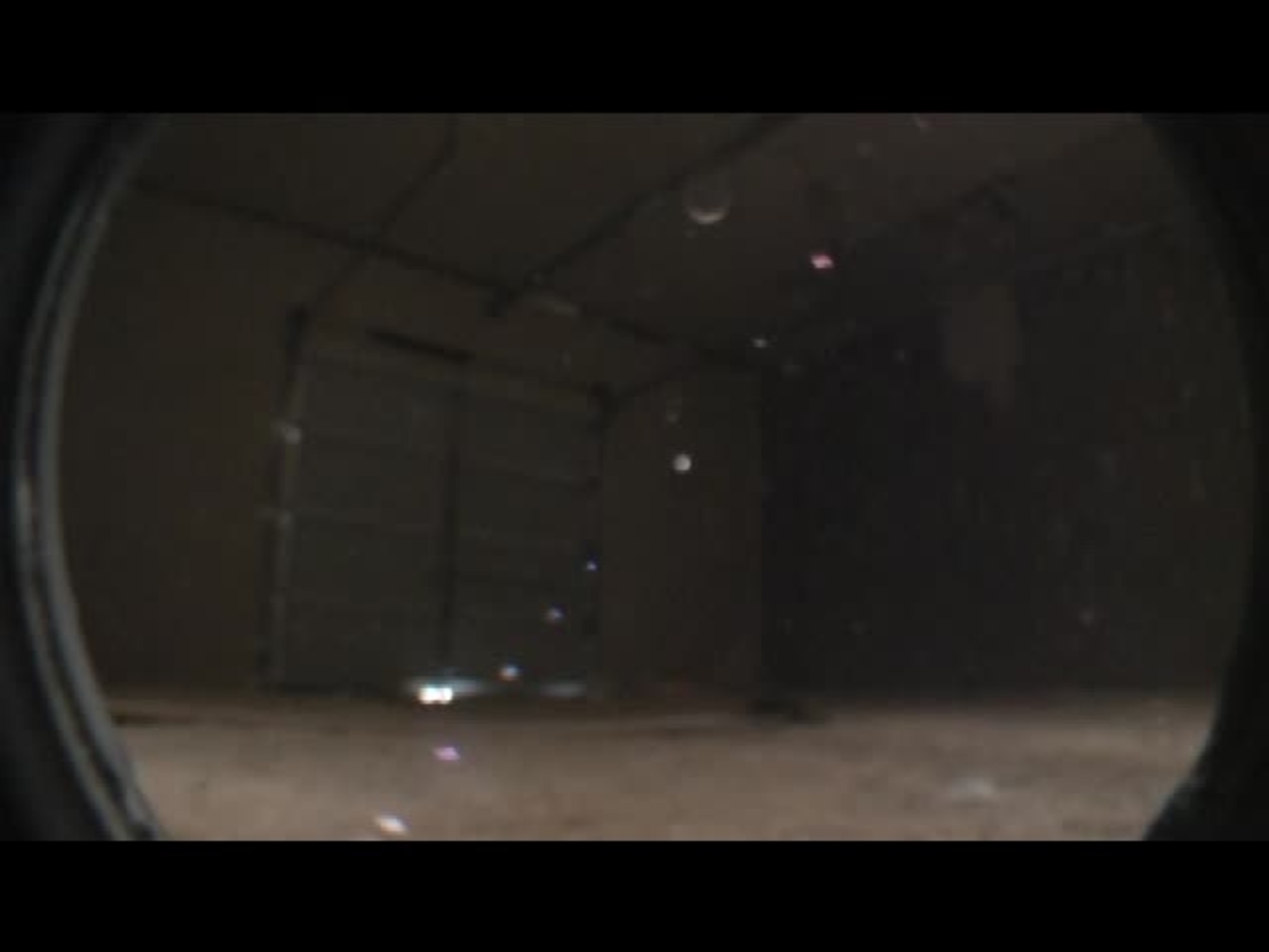 Test 11: Dispersion and Burning Behavior of Hydrogen Released in a Full-Scale Residential Garage in the Presence and Absence of Conventional Automobiles (View of garage interior from floor camera)