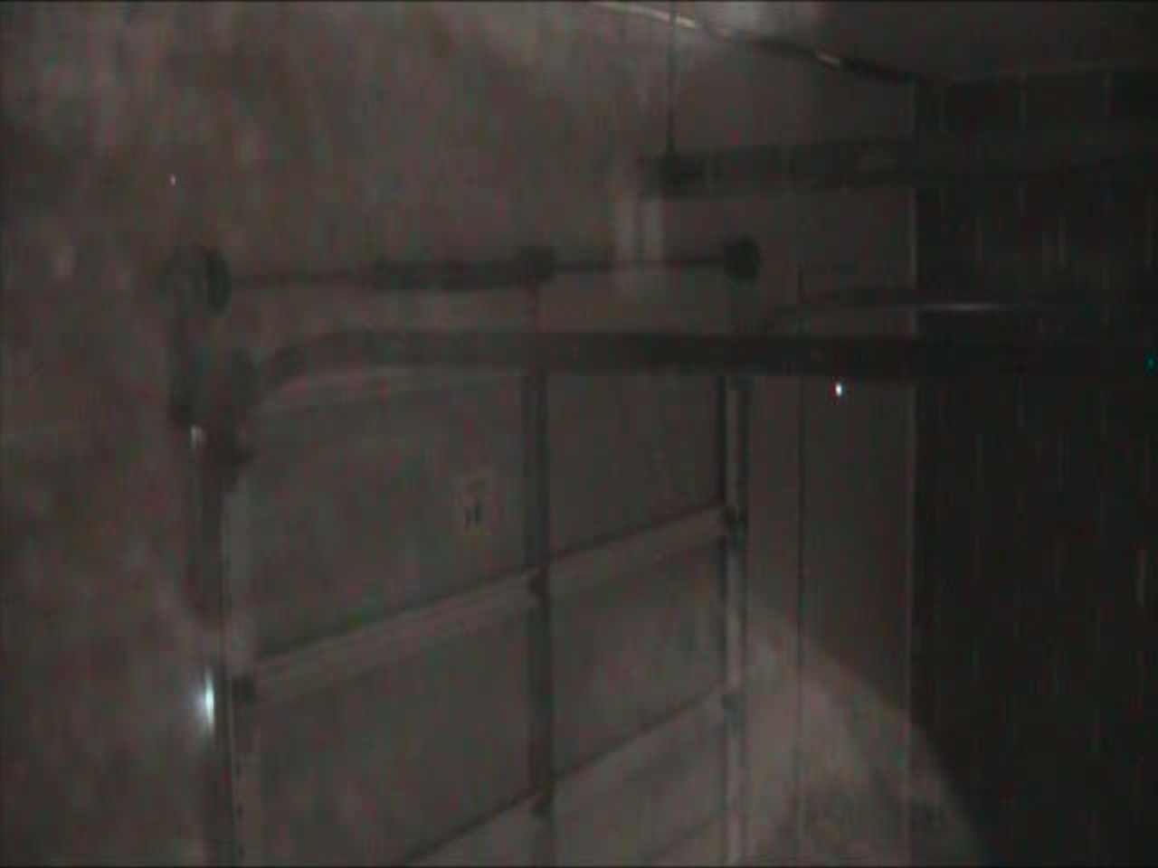 Test 11: Dispersion and Burning Behavior of Hydrogen Released in a Full-Scale Residential Garage in the Presence and Absence of Conventional Automobiles (View near garage door interior)