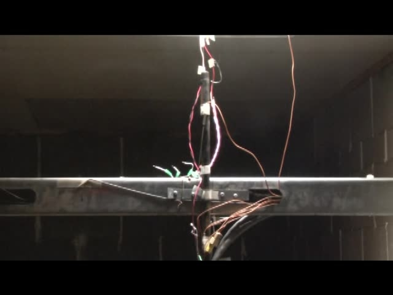 Test 12: Dispersion and Burning Behavior of Hydrogen Released in a Full-Scale Residential Garage in the Presence and Absence of Conventional Automobiles (View near ignition location and garage ceiling)