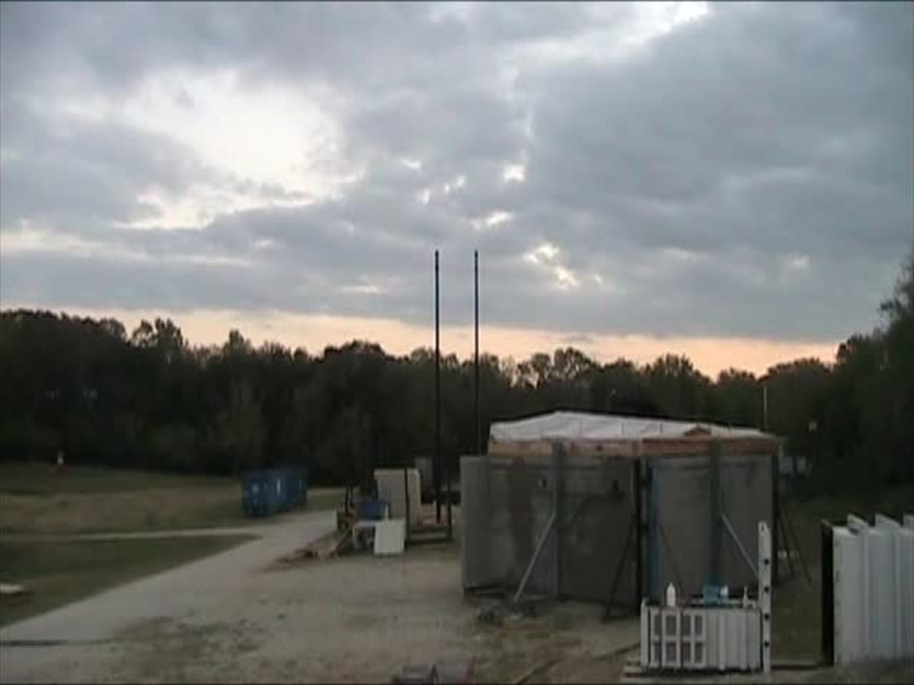 Test 8: Dispersion and Burning Behavior of Hydrogen Released in a Full-Scale Residential Garage in the Presence and Absence of Conventional Automobiles  (View of garage exterior from HD camera)