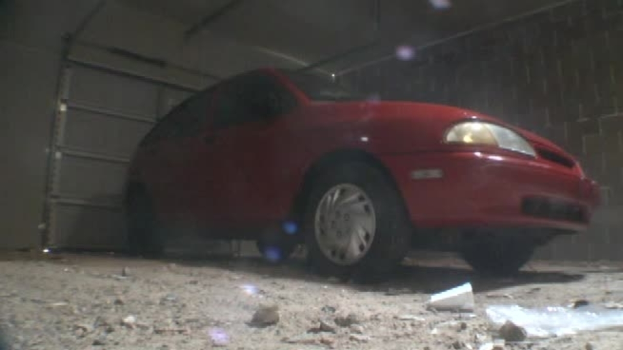 Test 6: Dispersion and Burning Behavior of Hydrogen Released in a Full-Scale Residential Garage in the Presence and Absence of Conventional Automobiles (View of garage interior from floor camera)