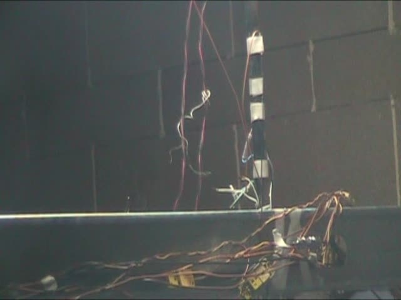 Test 9: Dispersion and Burning Behavior of Hydrogen Released in a Full-Scale Residential Garage in the Presence and Absence of Conventional Automobiles (View near ignition location and garage ceiling)