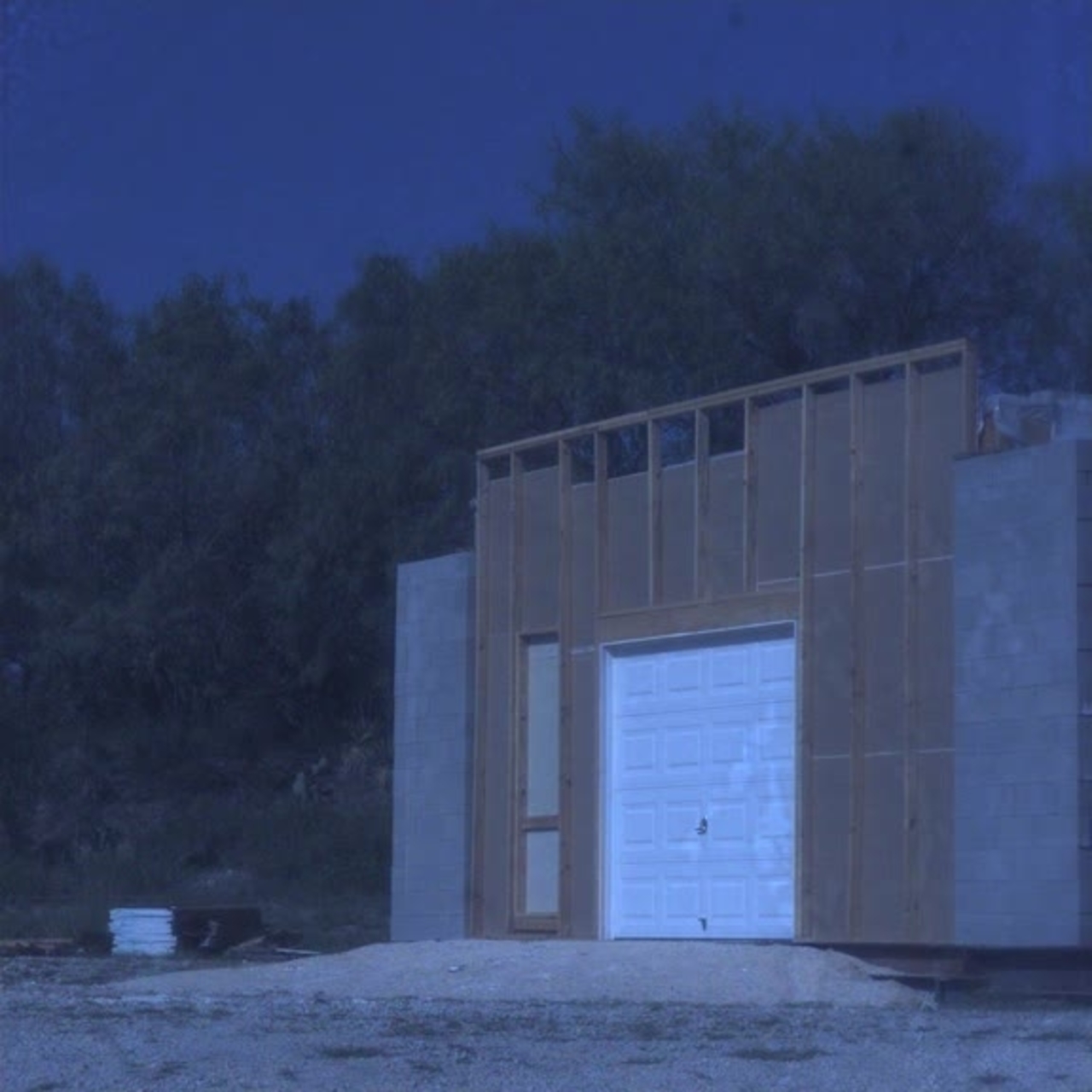 Test 13: Dispersion and Burning Behavior of Hydrogen Released in a Full-Scale Residential Garage in the Presence and Absence of Conventional Automobiles (View of garage exterior from high-speed camera)