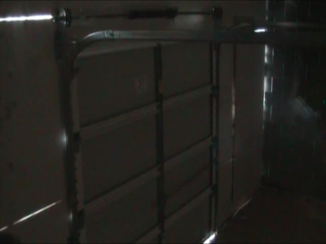 Test 12: Dispersion and Burning Behavior of Hydrogen Released in a Full-Scale Residential Garage in the Presence and Absence of Conventional Automobiles (View near garage door interior)
