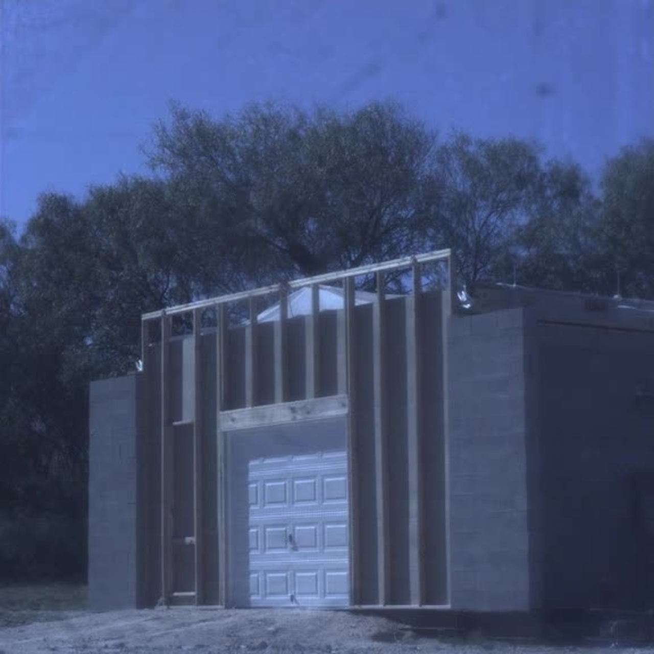Test 6: Dispersion and Burning Behavior of Hydrogen Released in a Full-Scale Residential Garage in the Presence and Absence of Conventional Automobiles (View of garage exterior from high-speed camera)