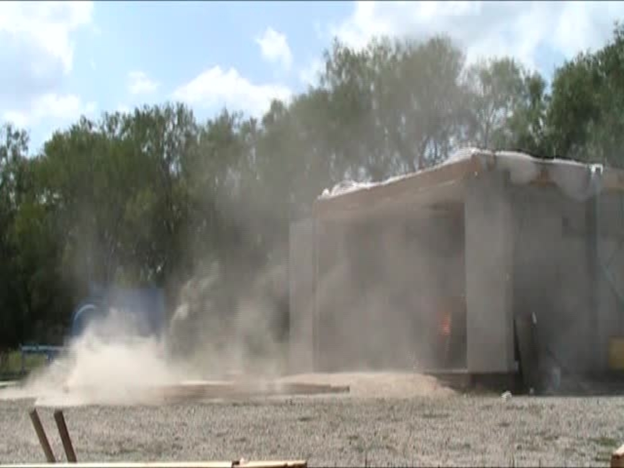 Test 3: Dispersion and Burning Behavior of Hydrogen Released in a Full-Scale Residential Garage in the Presence and Absence of Conventional Automobiles (View of garage exterior from HD camera)